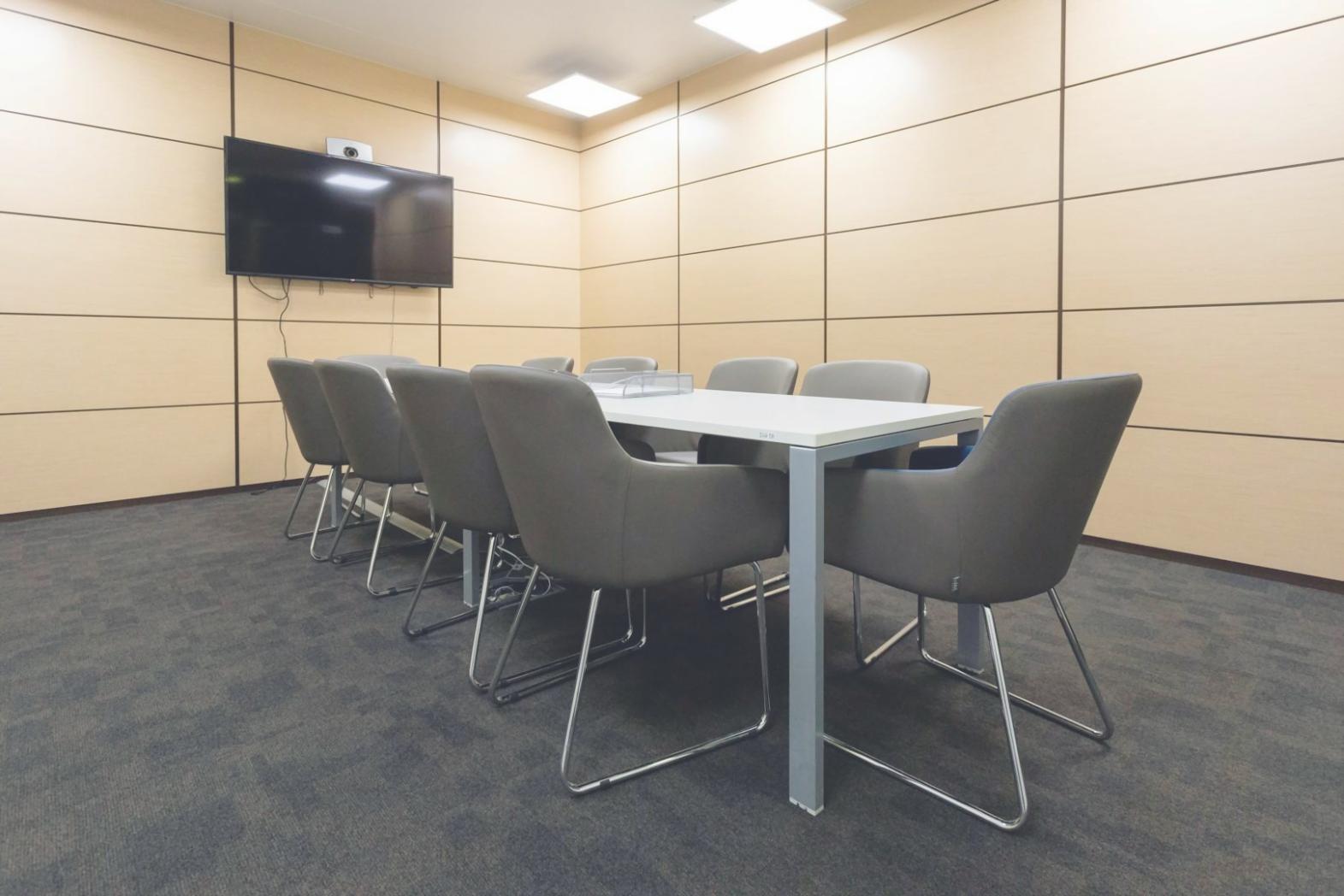 Professional learning environment with financial charts and educational materials displayed